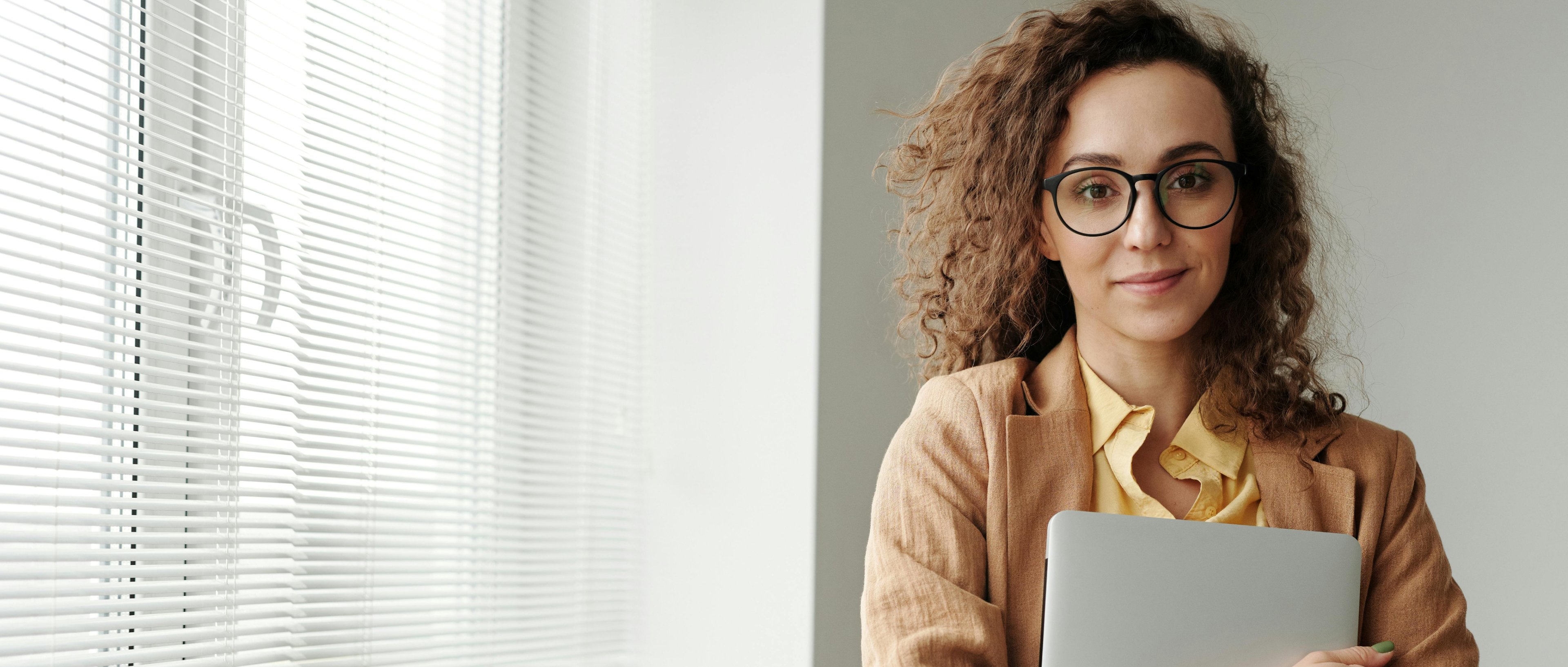 woman-with-laptop-choosing-top-registered-agent-service-corpify-inc